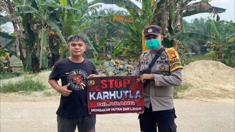 Banner “STOP KARHUTLA” Dibentangkan, Polisi Meranti Serukan Warga Waspada Kabut Asap Serta Tetap Memakai Masker